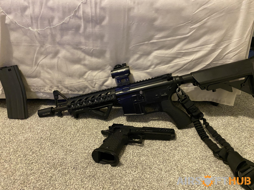 m4 rifle , and Hi  capa pistol - Used airsoft equipment