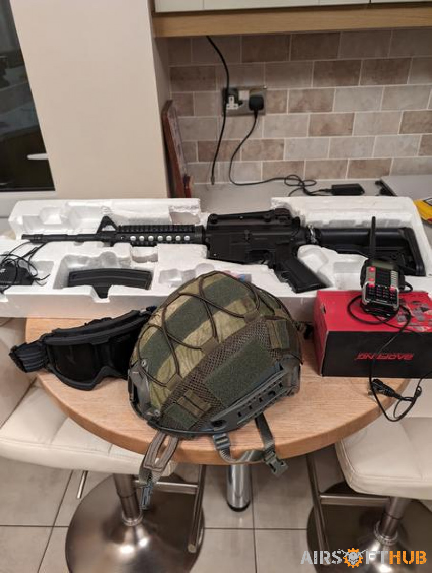 Rifle and radio - Used airsoft equipment