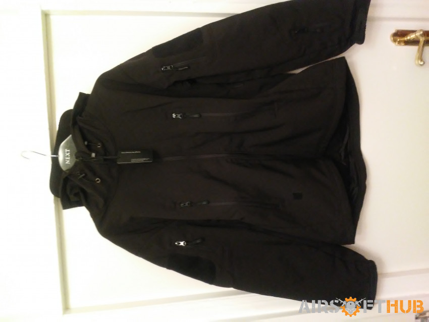Black Softshell Fleece Jacket - Used airsoft equipment