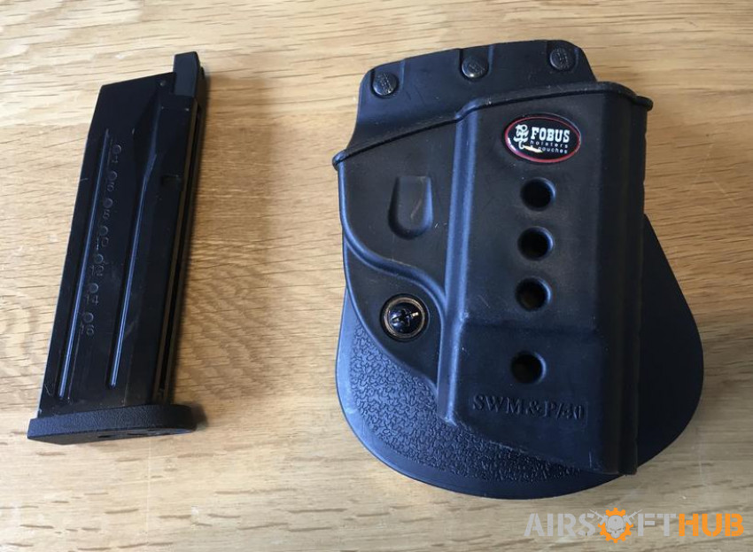 WE Toucan holster & mag - Used airsoft equipment