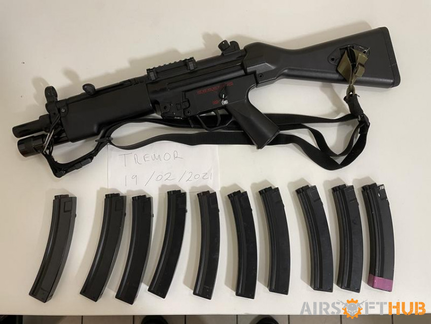 Upgraded ICS MP5 w/front torch - Used airsoft equipment