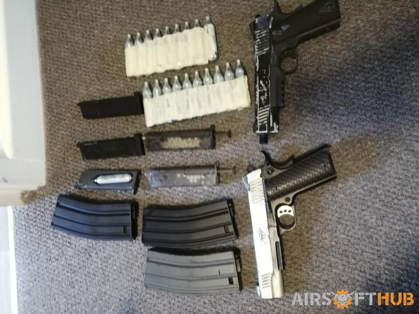 2 rifles + 2 guns - Used airsoft equipment