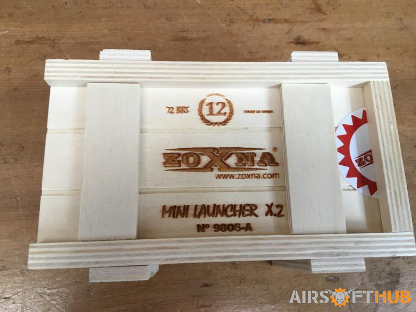 Zoxna Mini Launcher with box - Used airsoft equipment