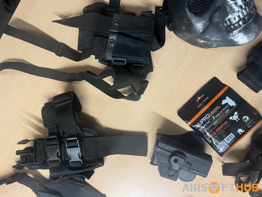 Air soft gear gun holders - Used airsoft equipment