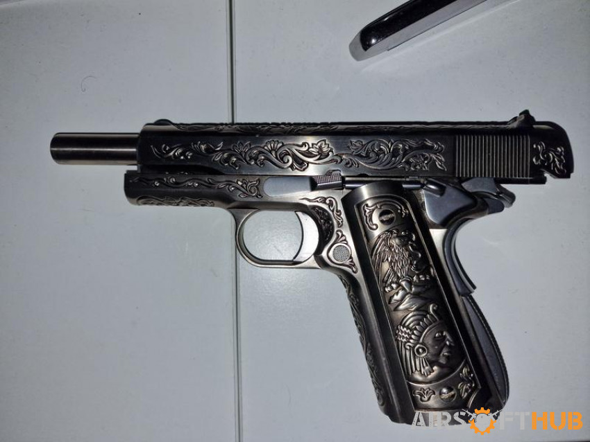 We 1911 engraved handgun - Used airsoft equipment