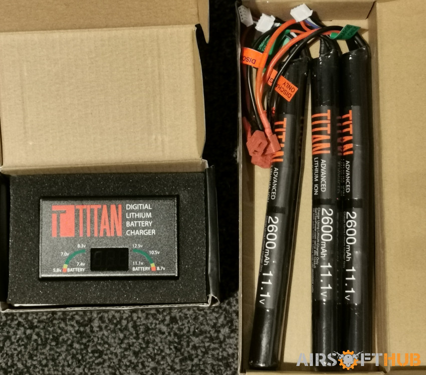 Titan batterys and charger - Used airsoft equipment