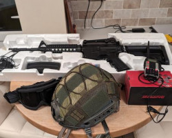 Rifle and radio - Used airsoft equipment