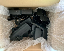 Box of Polymer holsters - Used airsoft equipment