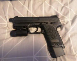 CO2 USP Pistol with torch and - Used airsoft equipment
