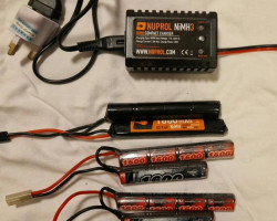 Assorted Batteries and Charger - Used airsoft equipment