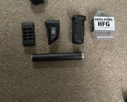 Grips and a silencer & battery - Used airsoft equipment
